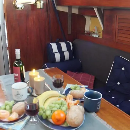 On A Sailboat In Harbour