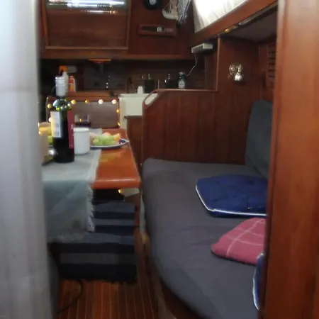 On A Sailboat In Harbour *