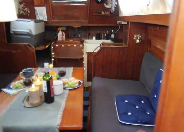 On A Sailboat In Harbour *