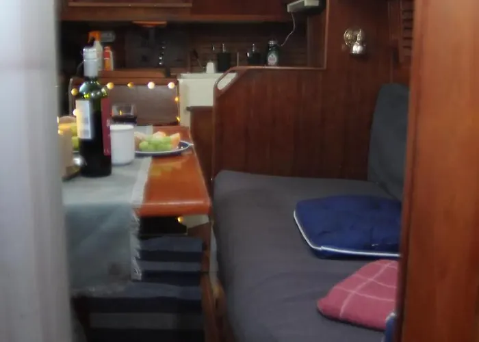 On A Sailboat In Harbour *